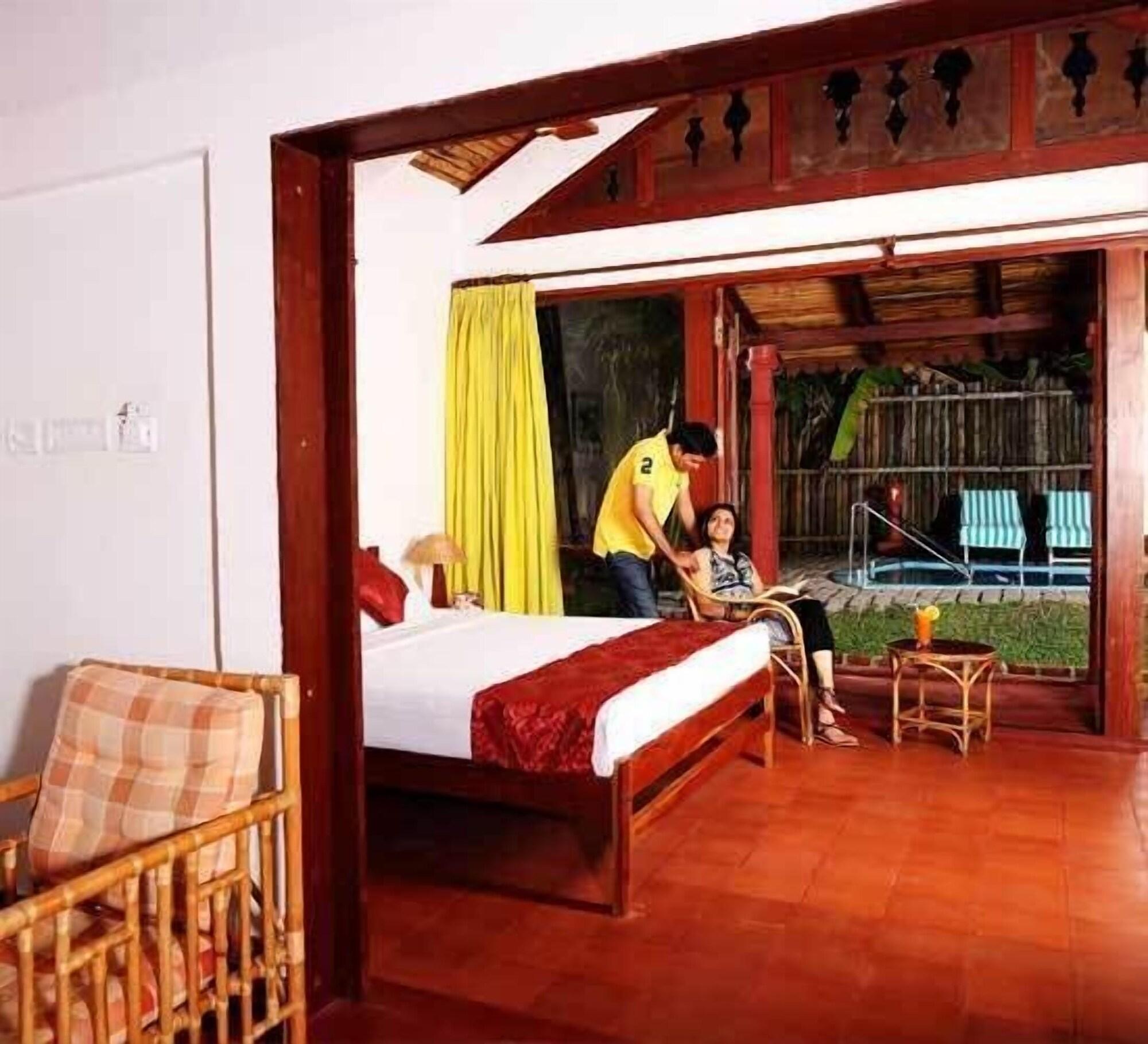 Abad Whispering Palms Hotell Kumarakom Exteriör bild