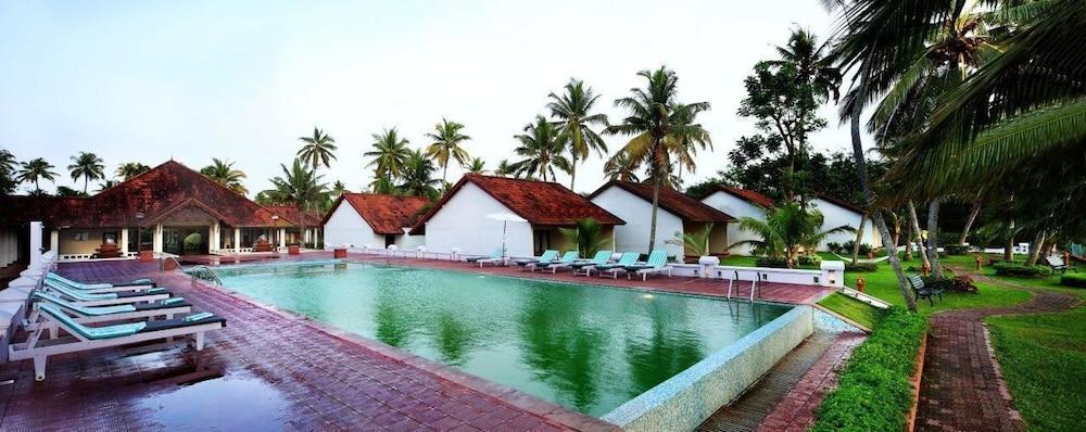 Abad Whispering Palms Hotell Kumarakom Exteriör bild