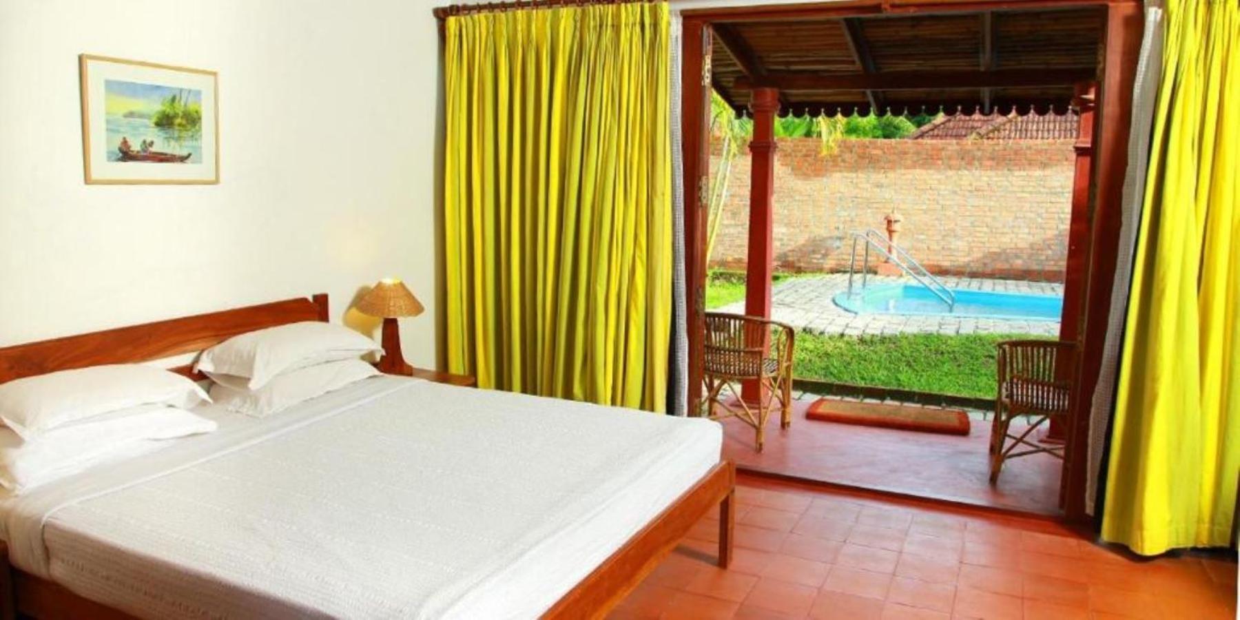 Abad Whispering Palms Hotell Kumarakom Exteriör bild