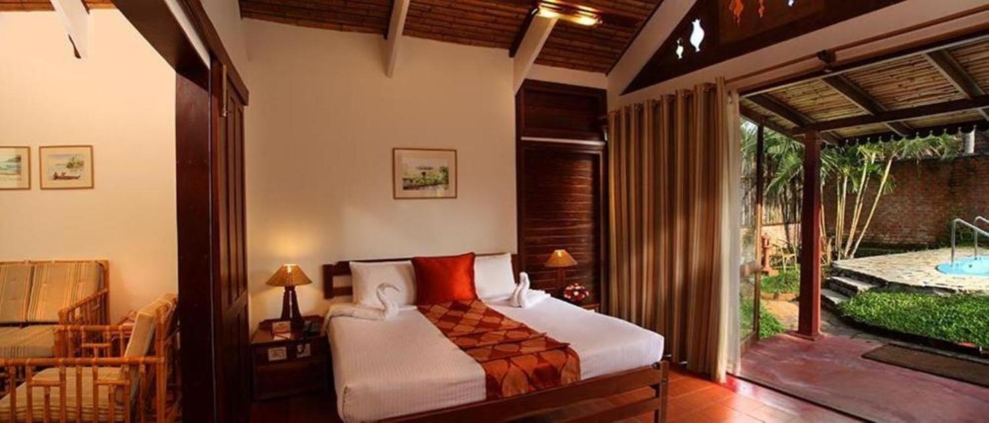Abad Whispering Palms Hotell Kumarakom Exteriör bild